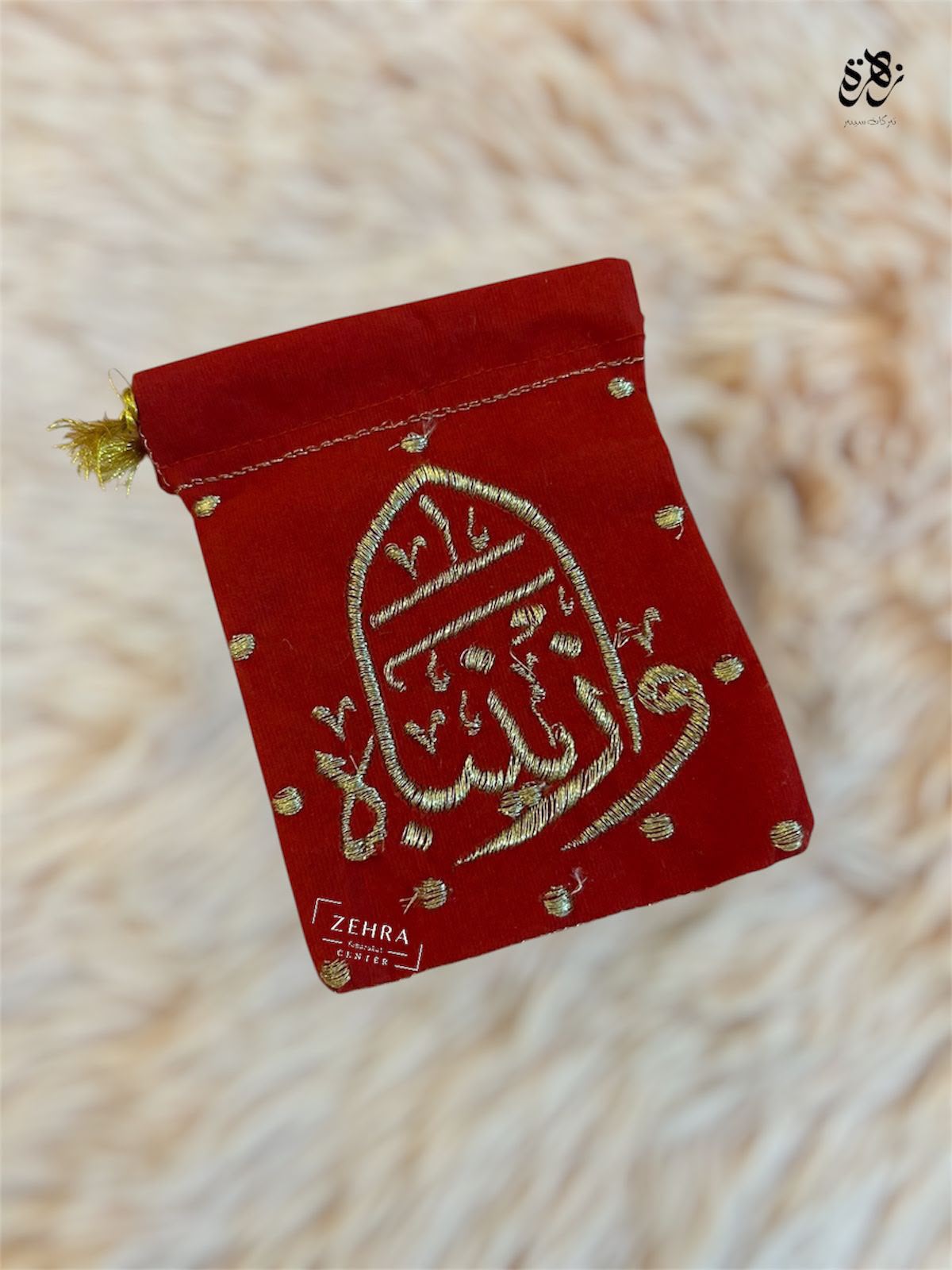 Red valvet pouches of of Bibi Zainab Sa